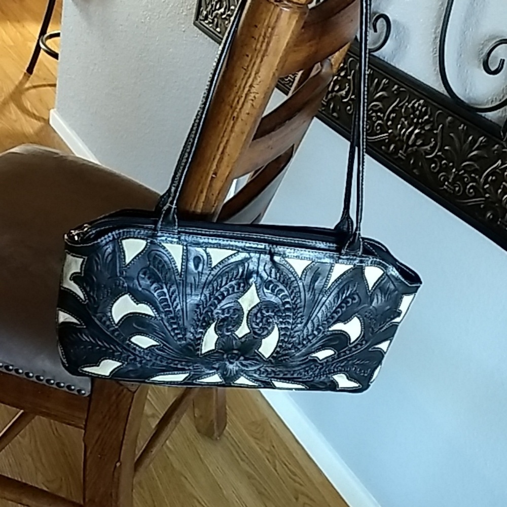Hand tooled leather shoulder bag